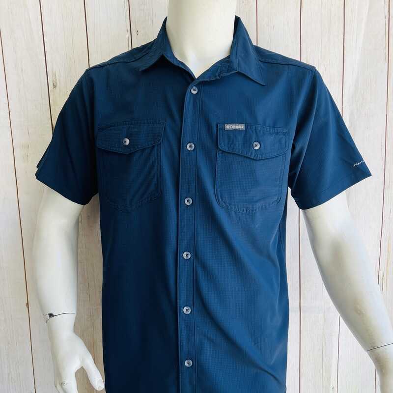 a mannequin wearing a blue shirt