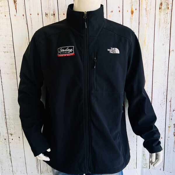 a black jacket with a logo on it